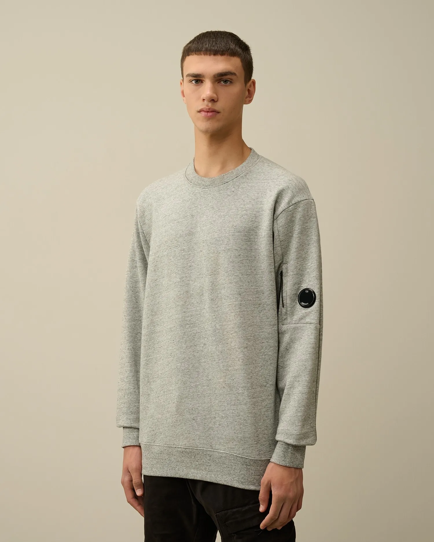 C.P. COMPANY ARM LENS SWEATSHIRT GREYSTONE MELANGE